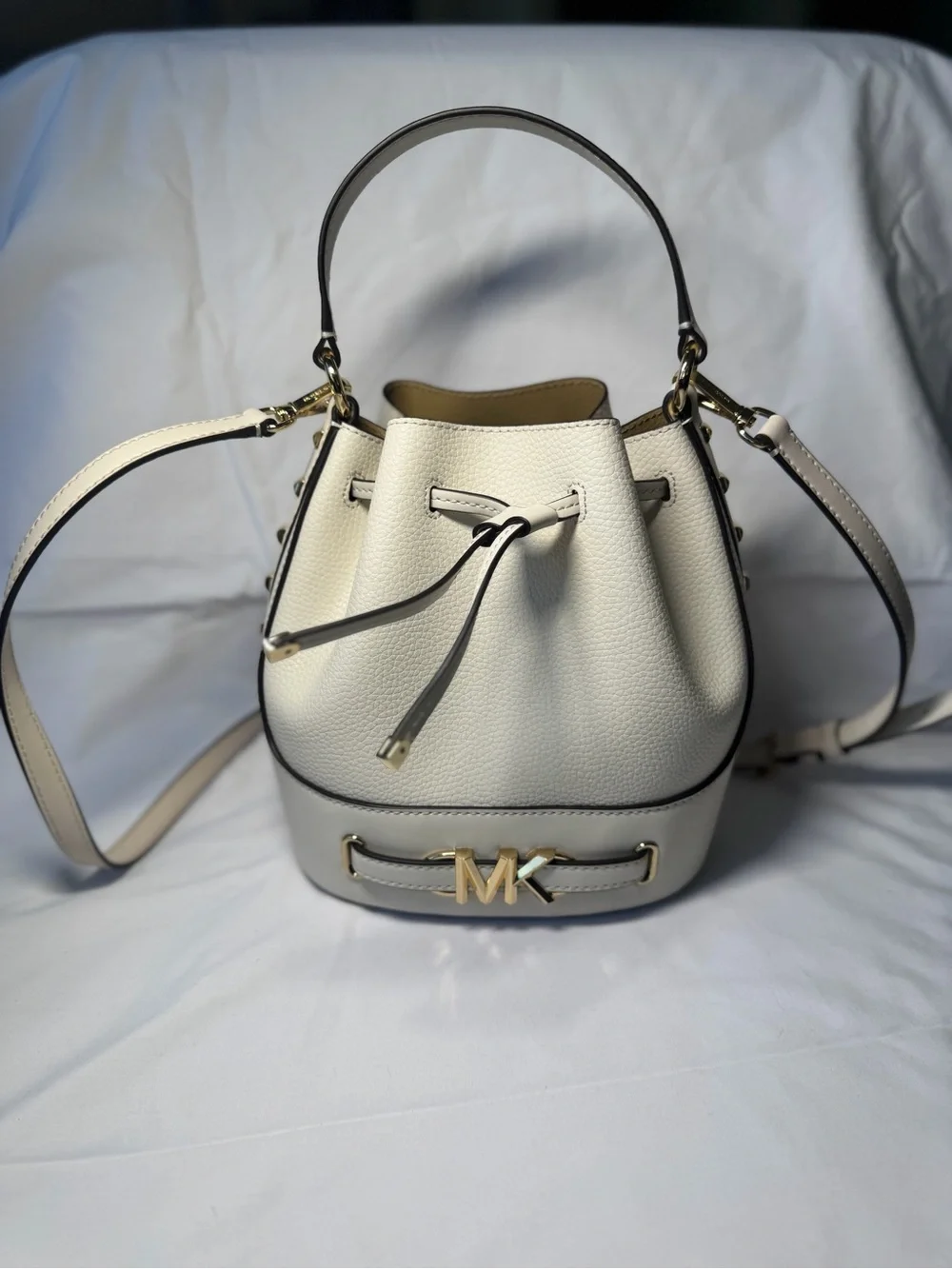 Michael Kors Cream Leather Mini Drawstring Bucket Bag with Gold MK Hardware